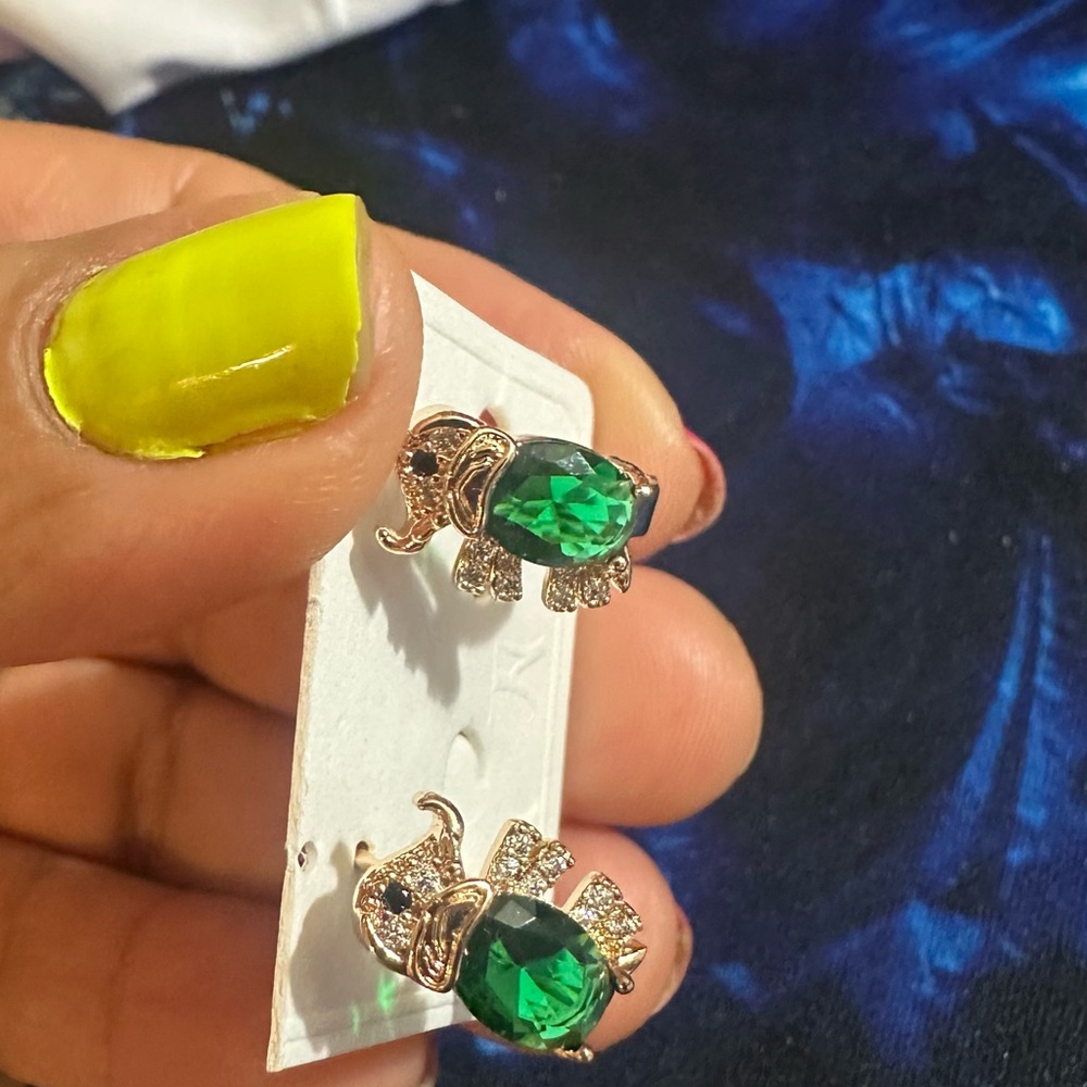 Gold Tone.              Elefant Earrings with Emerald Green Stones